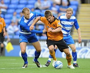Images Dated 27th July 2010: Matt Mills vs. Kevin Doyle: A Clash of Rivals in Reading vs. Wolverhampton Wanderers Pre-Season
