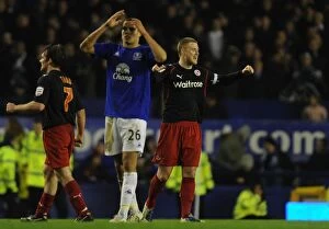 Images Dated 1st March 2011: Matt Mills's Dramatic FA Cup Upset: Reading's Celebration vs. Everton's Disappointment