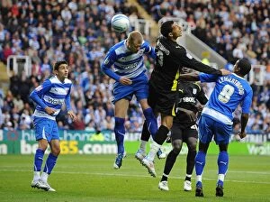 Images Dated 13th May 2011: Matthew Mills and Mikele Leigertwood vs. Jay Bothroyd: Intense Clash in Reading vs