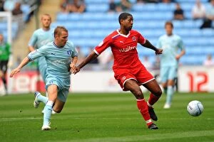 Images Dated 24th September 2011: McSheffrey vs. Leigertwood: Clash at Ricoh Arena - Coventry City vs