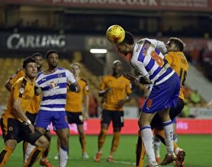 Wolves v Reading Collection: Michael Hector's Determined Header Attempt vs. Wolverhampton Wanderers in Sky Bet Championship