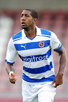 Images Dated 23rd July 2011: Mikele Leigertwood in Action: Reading FC's Pre-Season Clash against Northampton Town at Sixfields