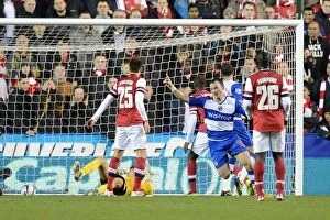 Capital One Cup : Round 4 : Reading v Arsenal : Madejski Stadium : 30-10-2012 Collection: Noel Hunt's Brace: Reading's Historic Four-Goal Rout of Arsenal in Capital One Cup