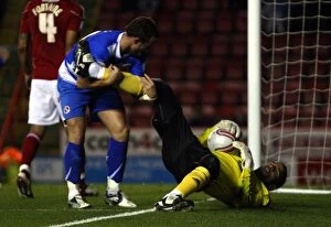 Images Dated 19th October 2010: Noel Hunt's Determined Battle with David James for the Corner Ball