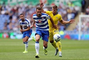 Images Dated 16th August 2015: Orlando Sa Slips Past Gaetano Berardi: A Pivotal Moment in Reading's Championship Clash with Leeds
