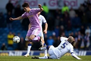 Leeds United v Reading Collection: Piazon Leaps Over Bellusci: A Sky Bet Championship Showdown