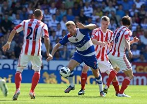 Images Dated 18th August 2012: Pogrebnyak vs. Shawcross: A Battle in the Premier League - Reading vs