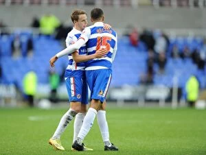 Images Dated 25th October 2014: Reading FC: Championship Victory Triumph - Chris Gunter and Michael Hector's Emotional Celebration