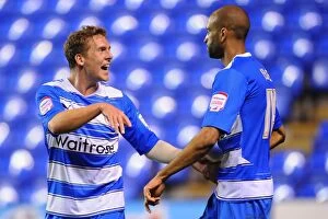 Images Dated 5th April 2011: Reading FC: Jimmy Kebe and Brian Howard's Thrilling Goal Celebration vs