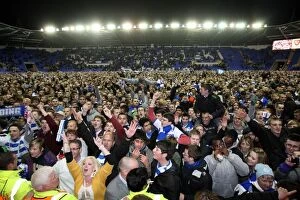 Images Dated 17th April 2012: Reading FC: Unforgettable Championship Victory - Fans Invade Madejski Stadium Pitch (17-04-2012)