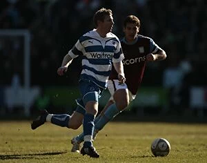 Images Dated 7th March 2010: Reading FC vs Aston Villa: Brynjar Gunnarsson Evasive Move Against Stiliyan Petrov in FA Cup Sixth