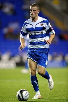 Images Dated 11th August 2009: Reading FC vs Burton Albion: Chris Armstrong's Thrilling Performance at Madejski Stadium in