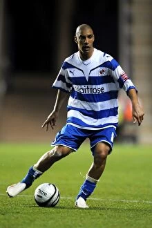 Images Dated 11th August 2009: Reading FC vs Burton Albion: James Harper Shines at Madejski Stadium in Carling Cup First Round