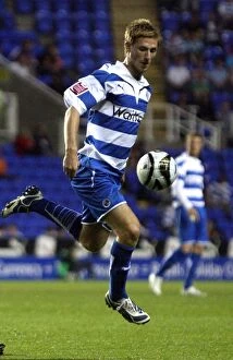 Images Dated 11th August 2009: Reading FC vs Burton Albion: James Henry in Action at the Carling Cup First Round, Madejski Stadium