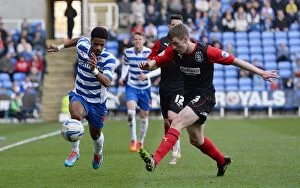 Images Dated 29th March 2014: Reading FC vs Huddersfield: A Fierce Sky Bet Championship Clash (2013-14)