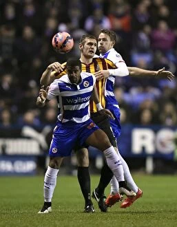 Images Dated 16th March 2015: Reading FC's McCleary and Gunter Deny Bradford City's Hanson in FA Cup Quarter-Final Replay