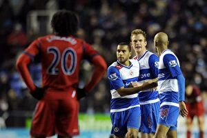 Reading v West Bromwich Albion : Madjeski Stadium : 12-01-2013 Collection: Reading FC's Triumph: Mariappa, Pearce, and Kebe's Celebration as Lukaku Disappointedly Looks On