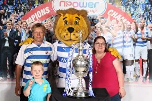 Images Dated 27th May 2012: Reading FC's Unforgettable Championship Victory: Triumphant Moment with Fans and the 2012 Trophy