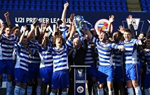 Images Dated 19th April 2014: Reading U21s Celebrate Premier League Cup Victory: Kuhl and Sweeney Lift the Trophy (2014)