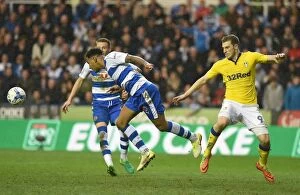 Reading v Leeds United Collection: Reading vs. Leeds United: Intense Moment between Liam Moore and Chris Wood at Madejski Stadium