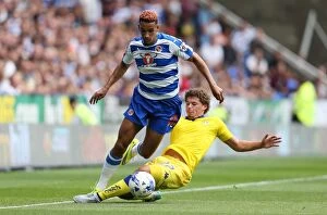 Images Dated 16th August 2015: Reading vs. Leeds United: Nick Blackman vs. Kalvin Phillips - Intense Tackle in Sky Bet