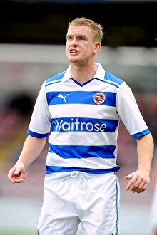 Images Dated 23rd July 2011: Reading's Alex Pearce in Action: Pre-Season Battle at Northampton Town's Sixfields Stadium