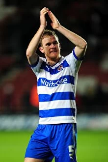 Images Dated 13th April 2012: Reading's Alex Pearce Faces Off Against Southampton in Intense Npower Championship Clash at St