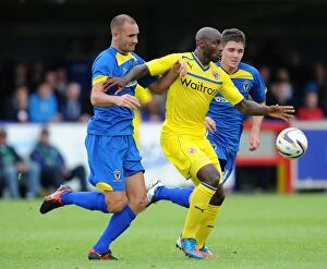 Pre Season Friendly - AFC Wimbledon v Reading - The Cherry Red Records Stadium Collection: Reading's Jason Roberts Sandwiched Between AFC Wimbledon's Mitchel-King and Harris