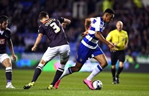 Images Dated 15th September 2015: Reading's Nick Blackman Slips Past Craig Forsyth in Sky Bet Championship Clash