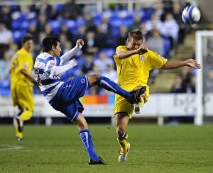 Images Dated 16th September 2009: Red Card Drama: McPhail Fouls Karacan in Reading vs. Cardiff Championship Clash