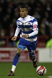 Images Dated 16th January 2010: Ryan Bertrand's Unyielding Performance: A Defiant Display of Determination in Reading FC's