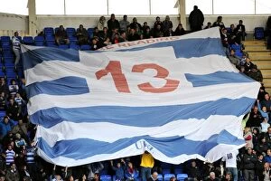 Images Dated 22nd October 2011: Sea of Blue: Unified Reading FC Fans Wave Massive Club Flag at Madejski Stadium