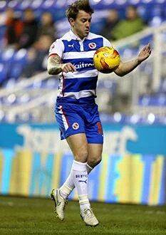 Images Dated 17th February 2015: Showdown at Madejski Stadium: Simon Cox Faces Wigan Athletic in Sky Bet Championship Clash
