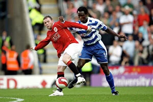 Images Dated 23rd September 2006: Sonko vs Rooney: A Legendary Clash - Reading vs Manchester United, September 23, 2006
