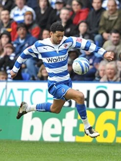Images Dated 27th March 2010: Thrilling Championship Clash: Jobi McAnuff's Exciting Moments at Madejski Stadium - Reading vs