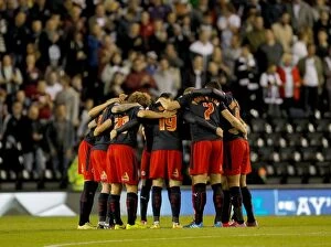 Images Dated 23rd September 2014: United in Focus: Reading FC's Pre-Match Huddle before Derby County's Capital One Cup Showdown