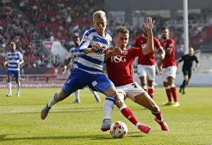 Images Dated 19th September 2015: Vydra vs. Bryan: Intense Clash Between Reading's Matej Vydra and Bristol City's Joe Bryan in Sky Bet