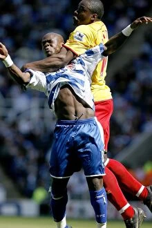 Images Dated 6th May 2007: Watfords Dan Shittu uses all his strength to keep Leroy Lita down