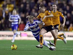 Images Dated 26th December 2015: Wolves vs. Reading: Edwards Fouls Vydra in Intense Sky Bet Championship Clash